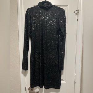 CG black fully sequined dress.